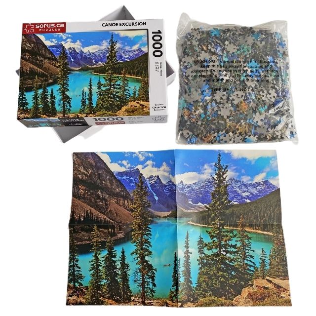 Puzzle box contents of Canoe Excursion on bright blue Moraine Lake in Alberta Canada 1000 piece jigsaw puzzle by Sorus Puzzles