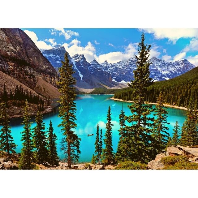 Puzzle image of Canoe Excursion on bright blue Moraine Lake in Alberta Canada 1000 piece jigsaw puzzle by Sorus Puzzles